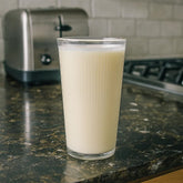 Vaso de vidrio transparente 200 ml con diseño de líneas verticales